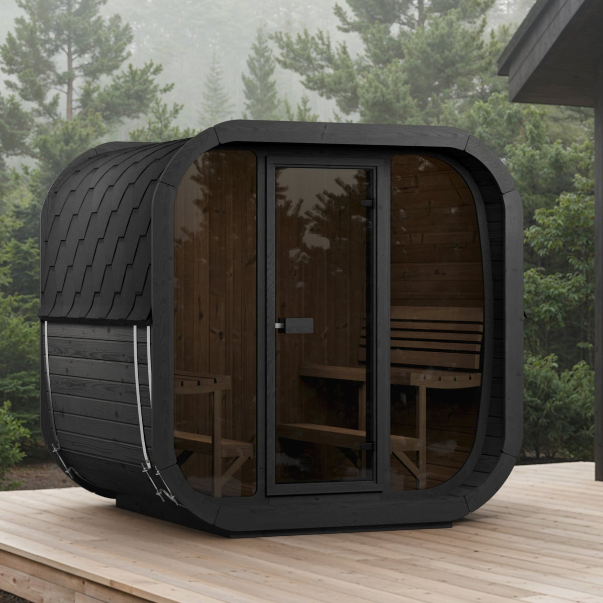 SaunaLife CL7G Cube Series 6-Person Outdoor Sauna Kit, black finish, on a deck in the pines