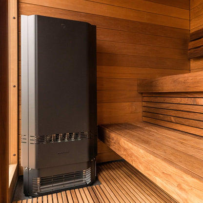 Saunum Air Perfect 7 heater from the package in the corner of a wood sauna