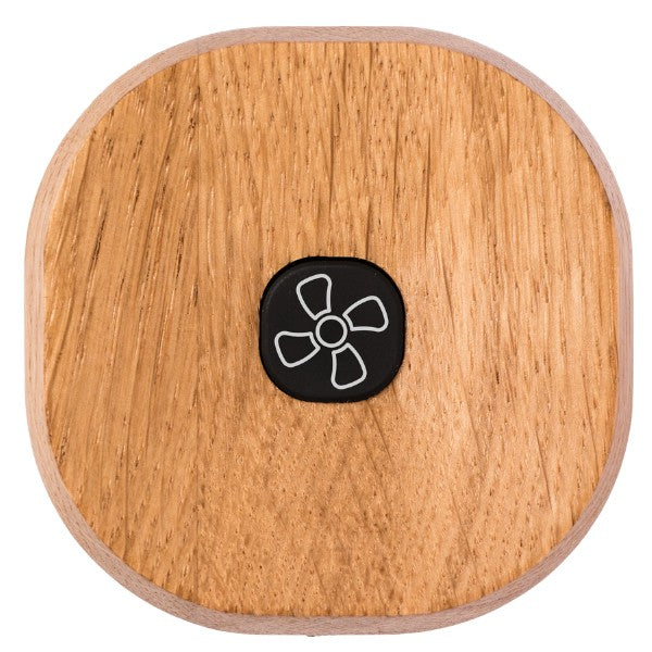 Saunum fan button, wood surround with a black fan symbol key