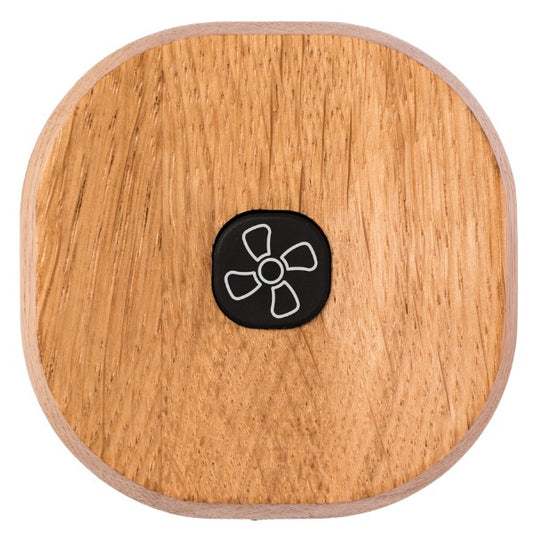 Saunum fan button, wood surround with a black fan symbol key