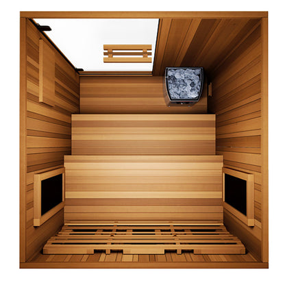 Looking down into the Finnmark FD-4 Trinity sauna at the two tier cedar bench and the Harvia stove with its stones