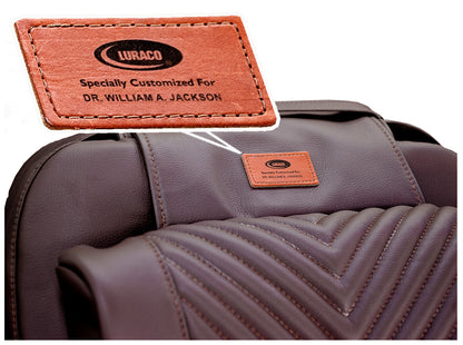 Personalized leather owner's name tag on a Luraco i9 Max Plus edition headrest
