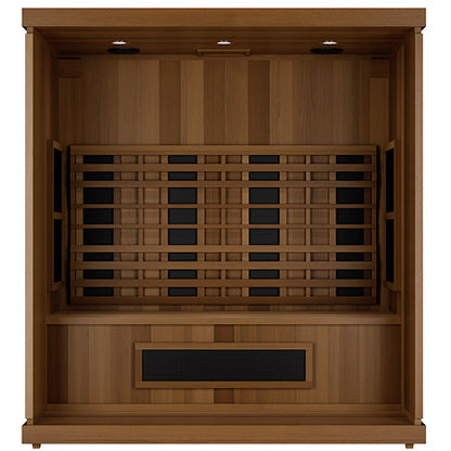 Inside the Finnmark FD-3 infrared sauna, showing the cedar bench, the backrest and the infrared panels