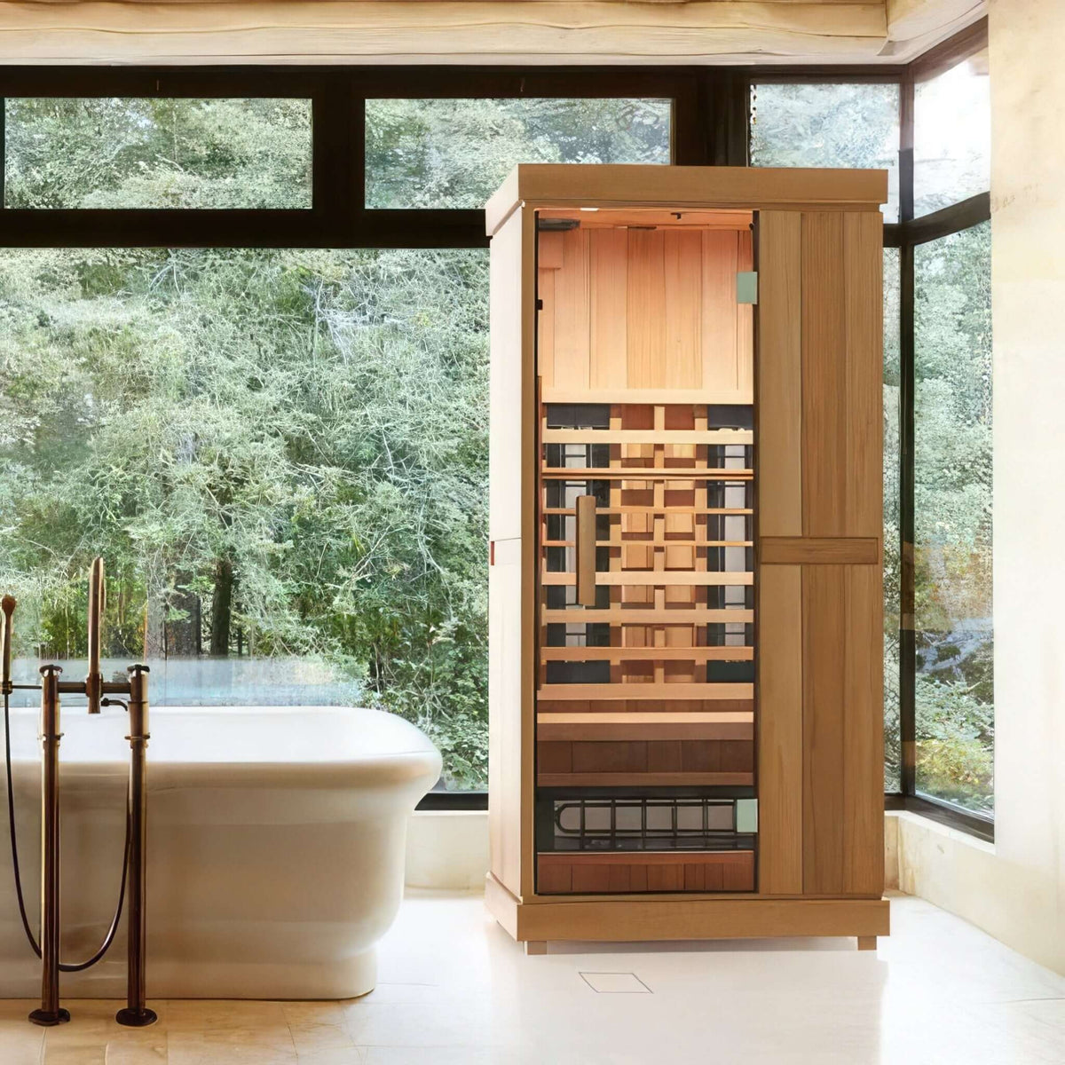 Finnmark FD-1 infrared sauna beside a freestanding tub in a window lined room, showing the cabin in a real home