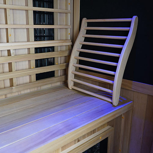 Ergonomic backrest and under bench lighting inside the Finnmark FD-1 infrared sauna