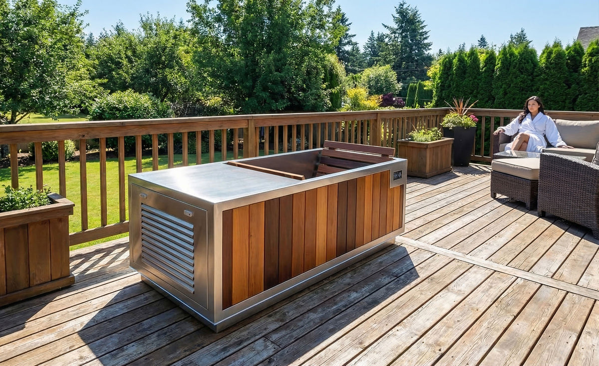 Finnmark SoulCold plunge tub on a deck with garden planters, seen from the chiller end