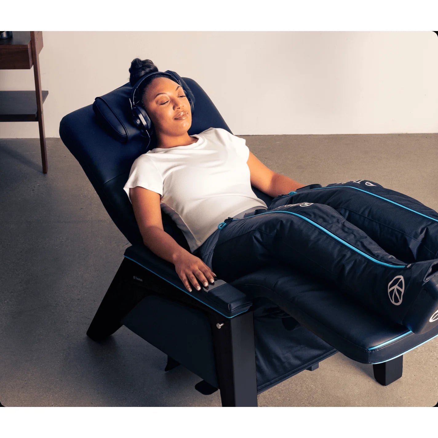 Therabody Lounger — vibroacoustic zero-gravity recovery chair — front product view on white background