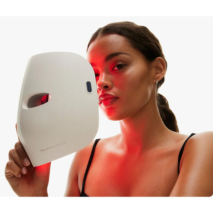 TheraFace Mask Glo — full-face LED light therapy mask by Therabody — front product view on white background