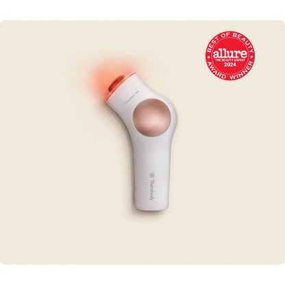 TheraFace Pro — microcurrent, LED & percussive facial therapy by Therabody — front product view on white background