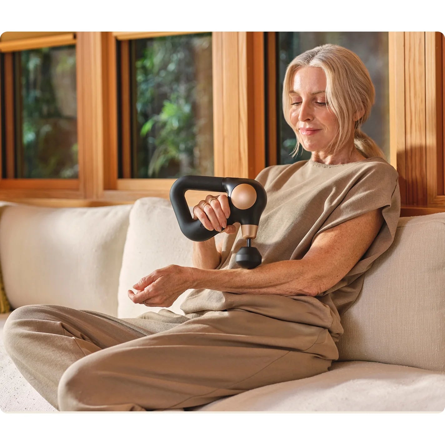 Theragun Sense G2 — smart quiet percussive therapy device by Therabody — product view 3