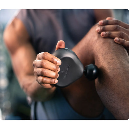 Theragun Mini 3.0 Black — ultra-compact percussive therapy device by Therabody — product view 2