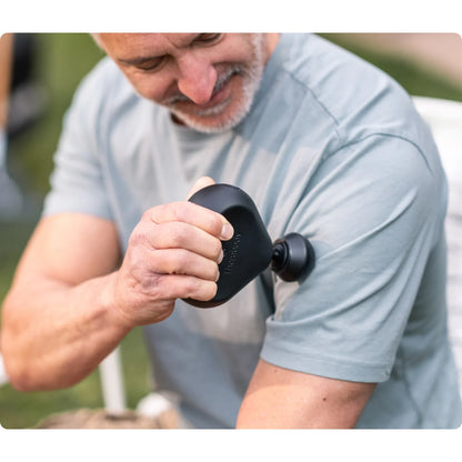 Theragun Mini 3.0 Black — ultra-compact percussive therapy device by Therabody — product view 3