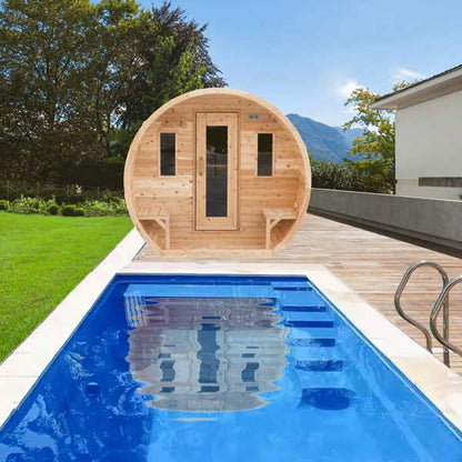CT Elation barrel sauna installed beside a backyard swimming pool