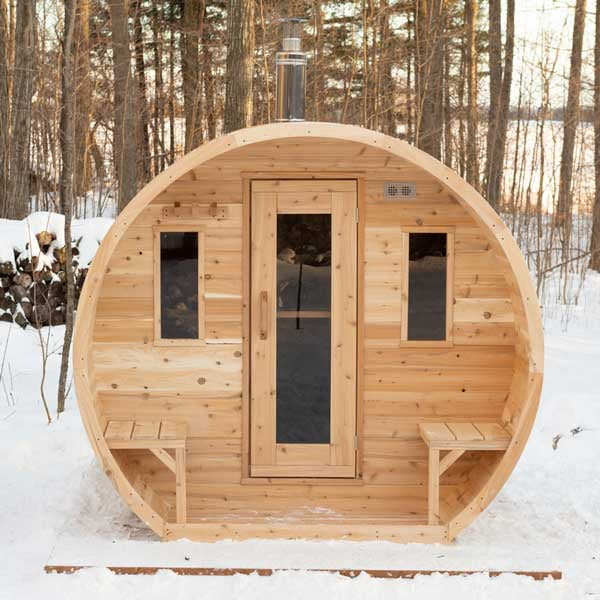 CT Elation sauna front elevation in winter showing the door, the two front windows and the small outdoor benches