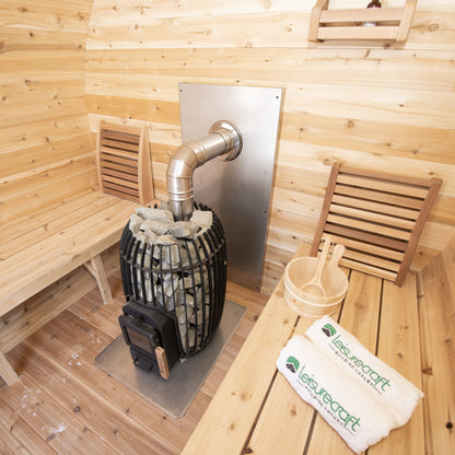 Close view of the wood stove, rock cage and heat shield inside the CT Elation sauna