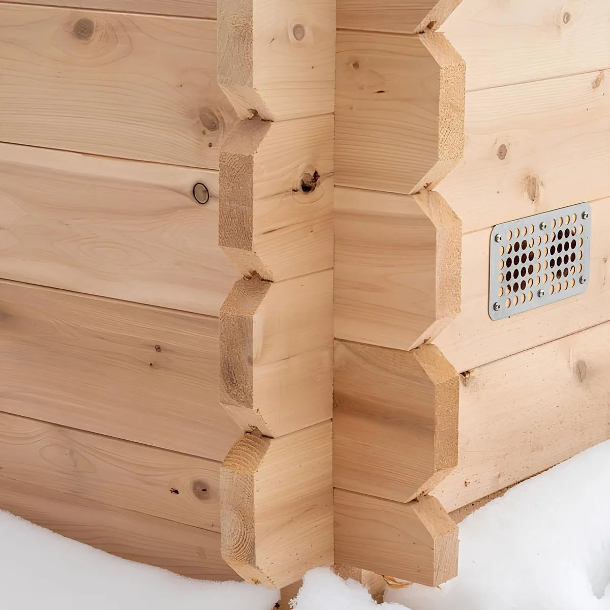 Interlocking cedar corner joint and exterior vent detail on the CT Granby cabin sauna