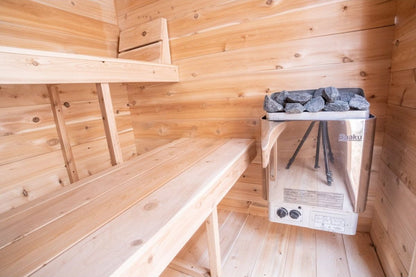 Electric heater with rocks mounted inside the CT Granby cabin sauna