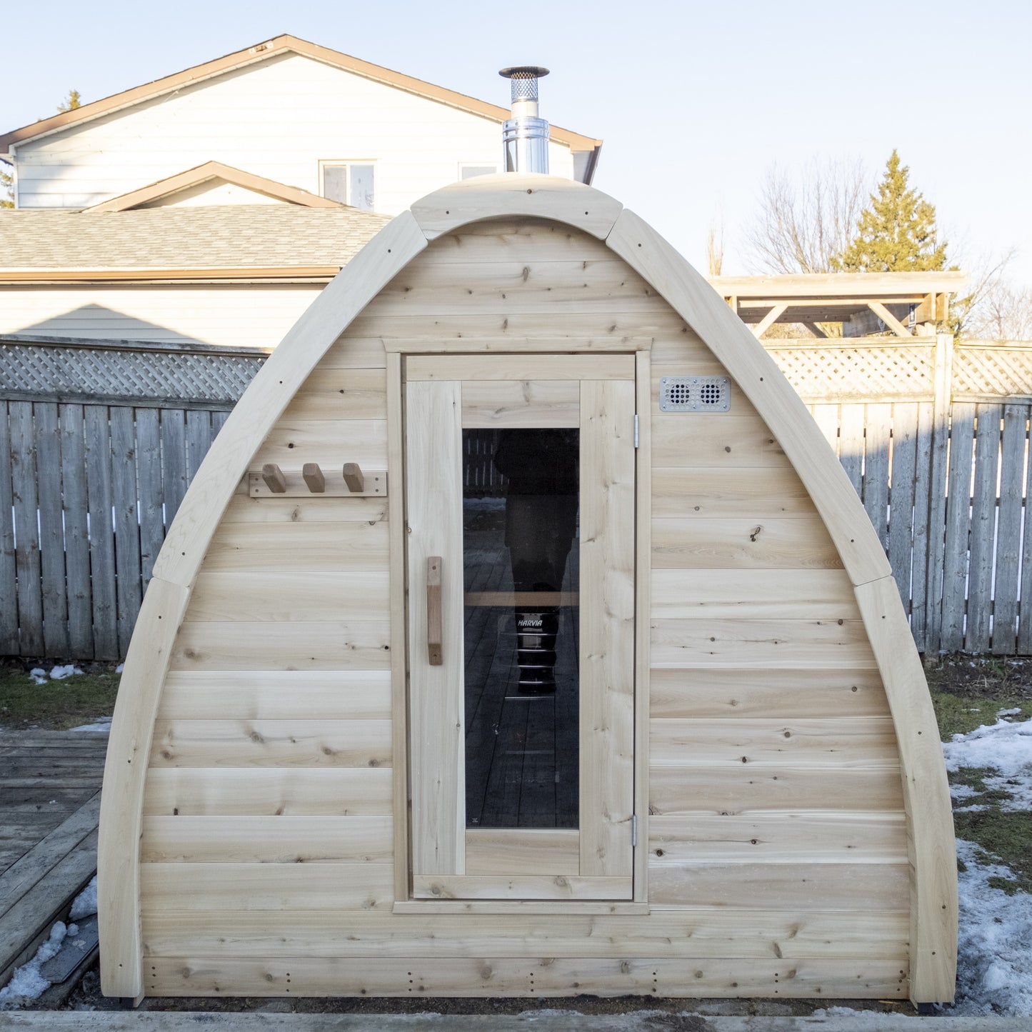 CT MiniPOD sauna front elevation showing the cedar door with bronze glass and the pod profile