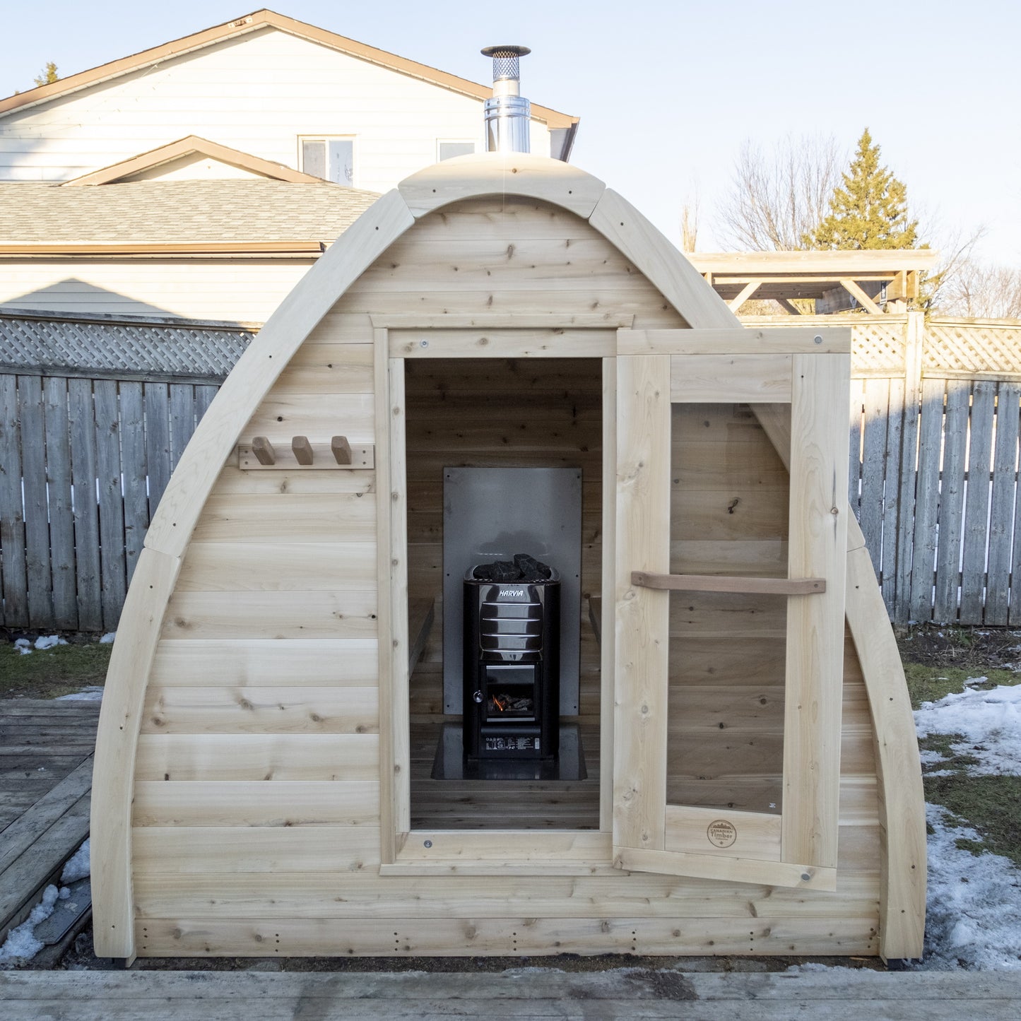 CT MiniPOD sauna with the door open and the sauna heater visible inside