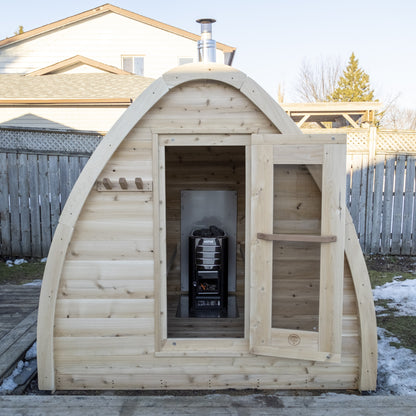 CT MiniPOD sauna with the door open and the sauna heater visible inside