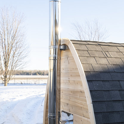 CT MiniPOD sauna chimney rising past the triple-layer shingle roof