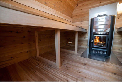 Sauna heater with fire window and stainless heat shield inside the CT MiniPOD sauna