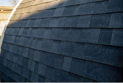 Close-up of the black asphalt shingle roof on the CT MiniPOD sauna