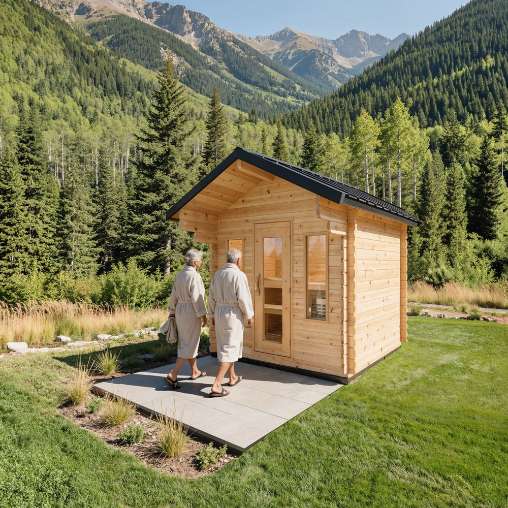 CT Palmer cabin sauna on a lawn with a mountain backdrop