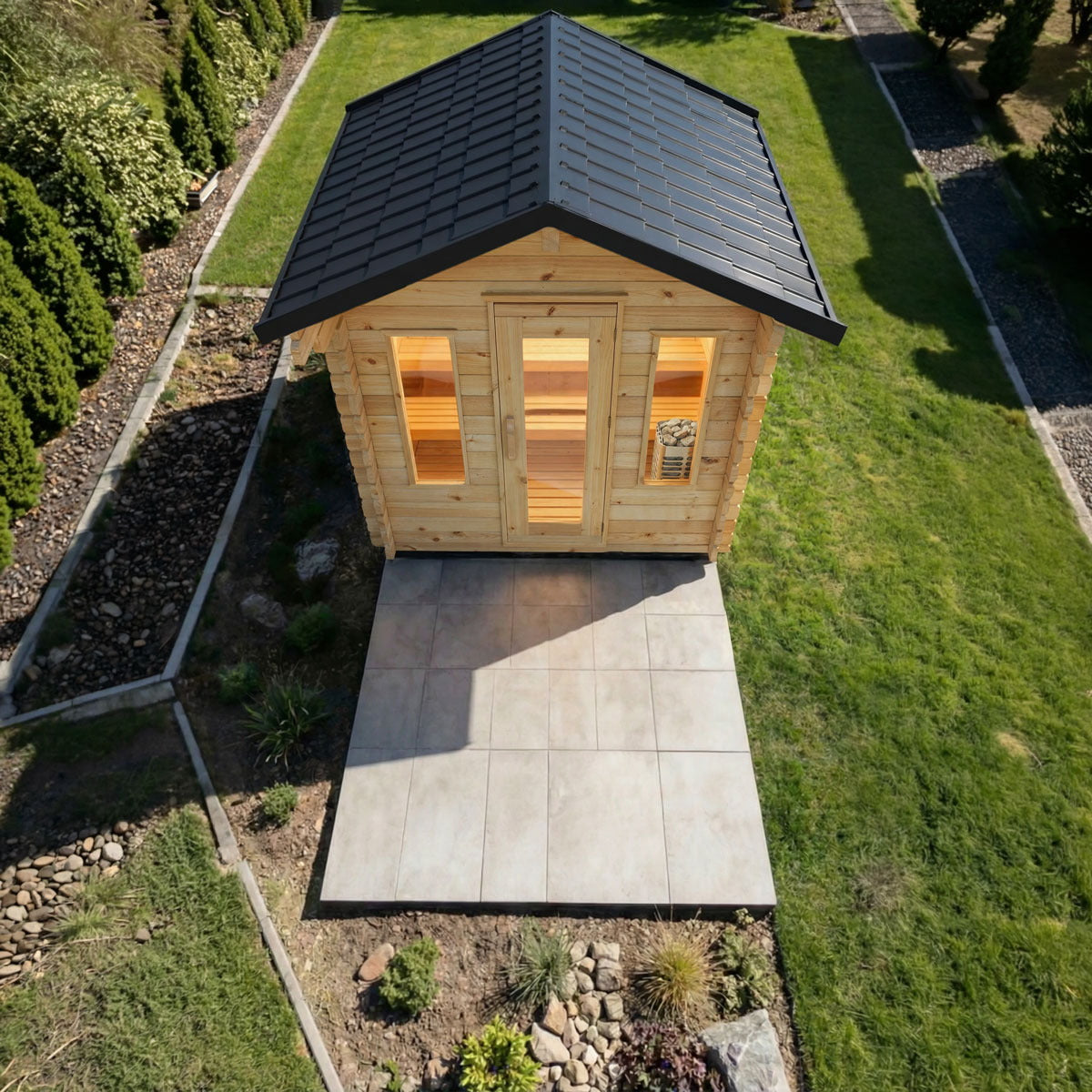 Overhead view of the CT Palmer cabin sauna showing the gable metal roof and patio pad