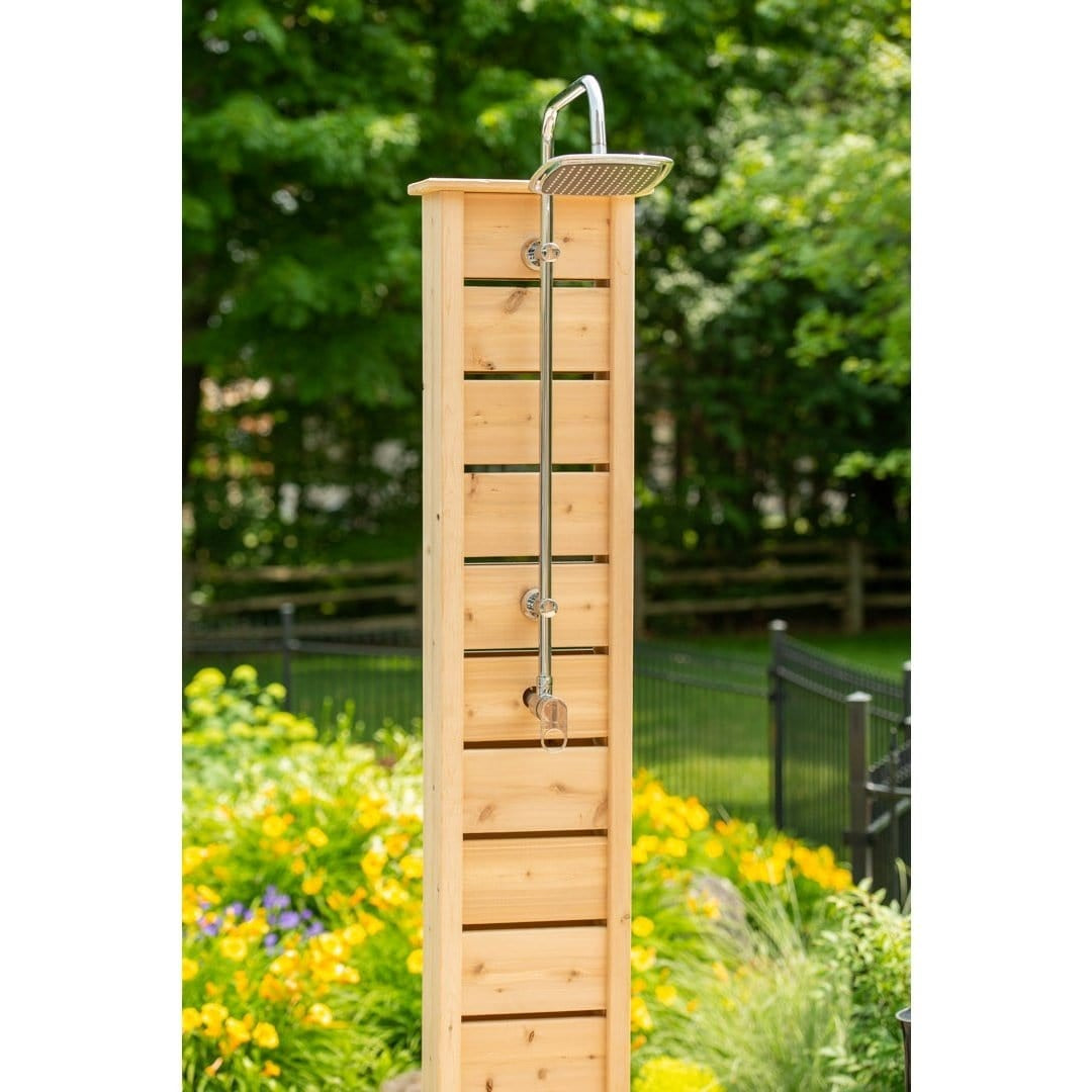 Upper part of the Sierra pillar among garden plantings, square rain head and lever valve fitted, both sold separately, base out of frame.