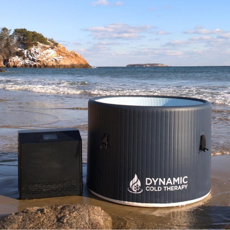 Dynamic Cold Therapy round inflatable cold plunge with chiller on a beach