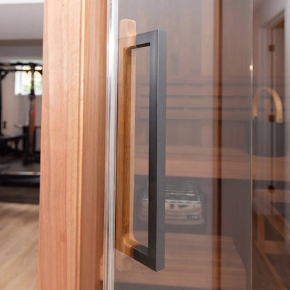 Glass door and long handle of the CT Element Nook seen from outside