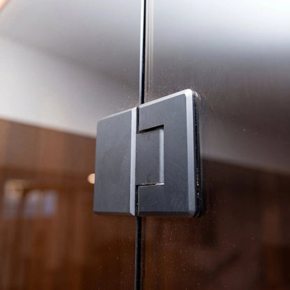 Close-up of the glass door hinge hardware on the CT Element Nook