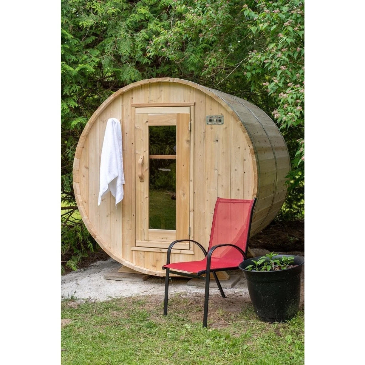 CT Harmony barrel sauna from an angle, showing the barrel length and the aluminum bands