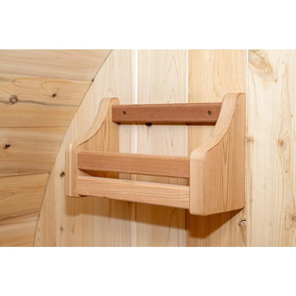 Cedar headrest mounted on the curved wall of the CT Harmony barrel sauna