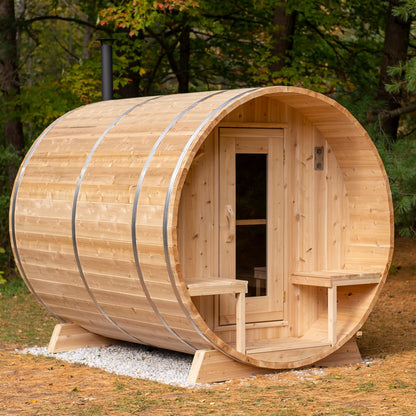 Dundalk LeisureCraft CT Serenity barrel sauna outdoors, showing the covered front porch and its benches