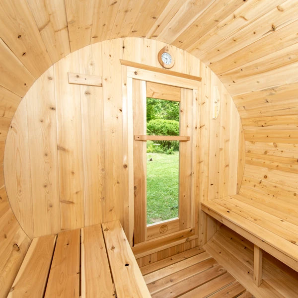 Looking out through the CT Serenity barrel sauna window from the bench