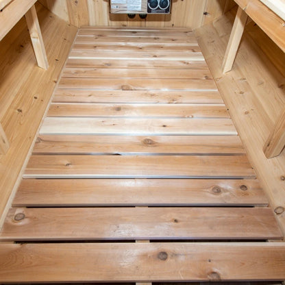 Slatted cedar floor and bench supports inside the CT Serenity barrel sauna