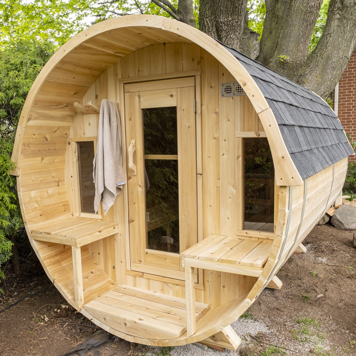 CT Tranquility barrel sauna with the optional shingle roof fitted, door open