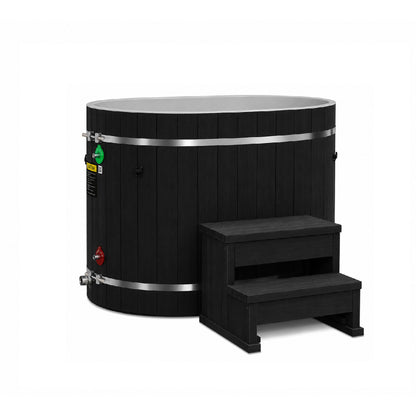 Dynamic Cold Therapy Black Oval Barrel Cold Plunge Tub, side view of the black synthetic wood exterior with the two tier entry step and the inlet and outlet fittings