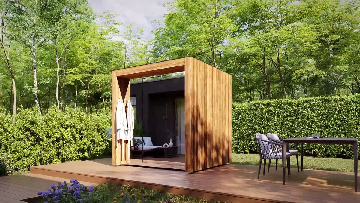 ThermaSol Fortis outdoor sauna cabin on a garden deck, three quarter view