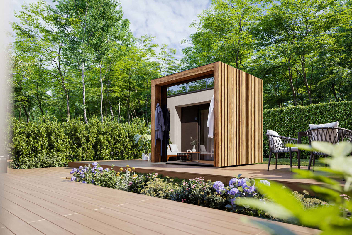 ThermaSol Fortis outdoor sauna cabin on a deck in a garden setting