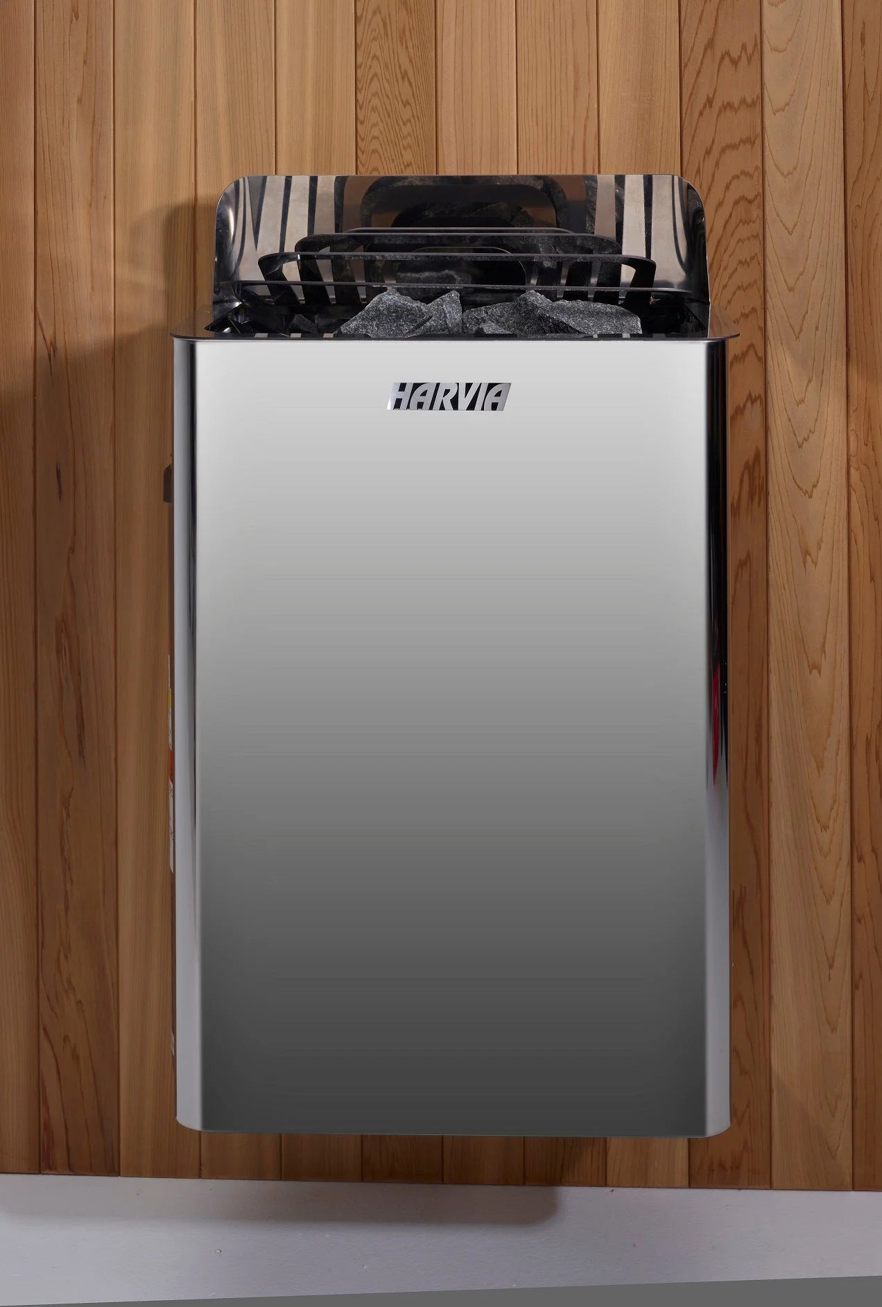 Sauna rocks loaded in the Harvia steam stove basket — Golden Designs Vorarlberg Flat Roof Outdoor Sauna (GDI-8005-01)
