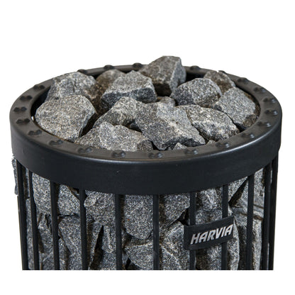 Harvia AC3000 split-face stones stacked in the stone basket of a Harvia heater
