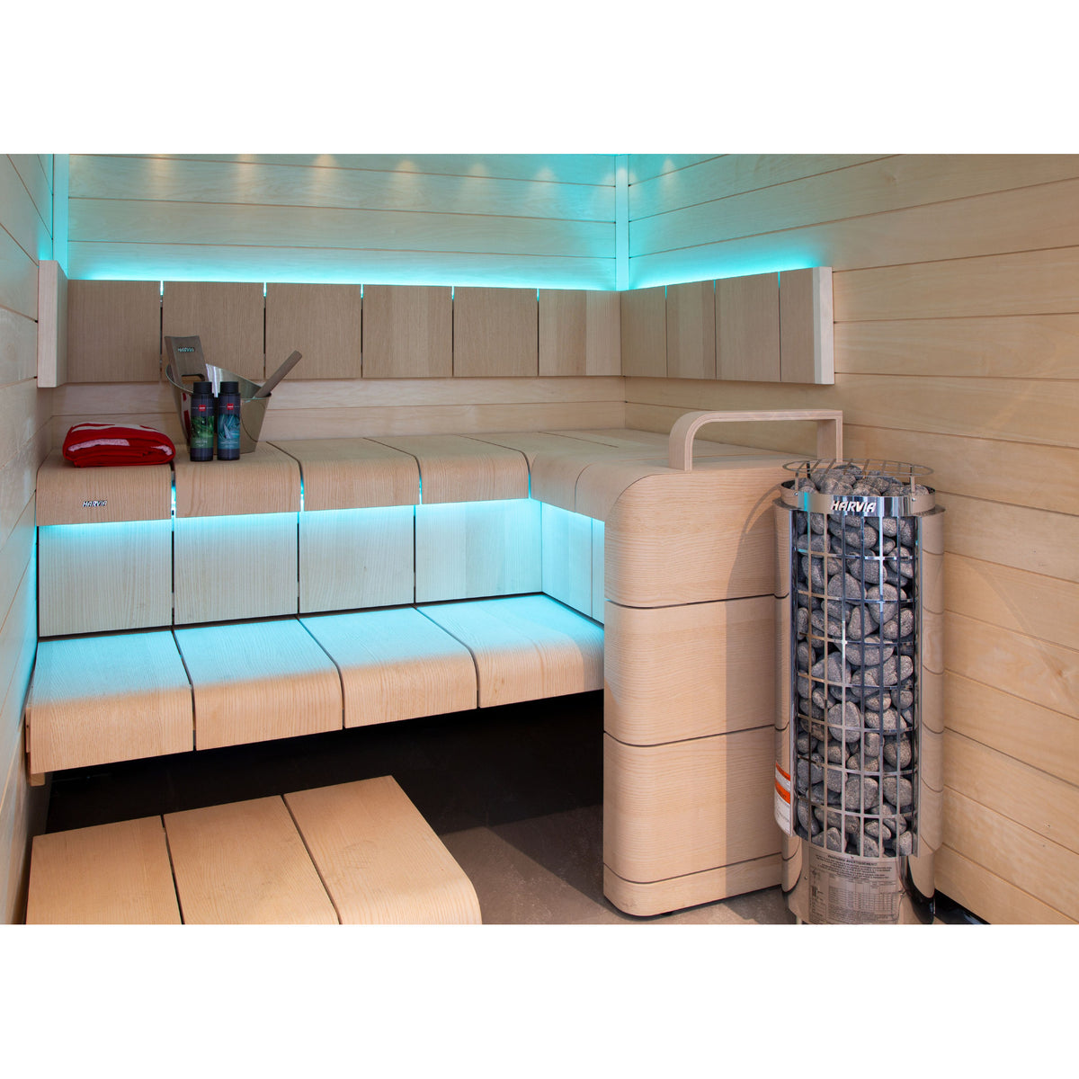 Harvia Cilindro PC80E 8kW in a sauna with cyan LED bench lighting