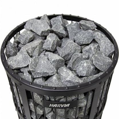 Top view of the stones stacked in the black steel stone basket of the Harvia Legend 150 SL