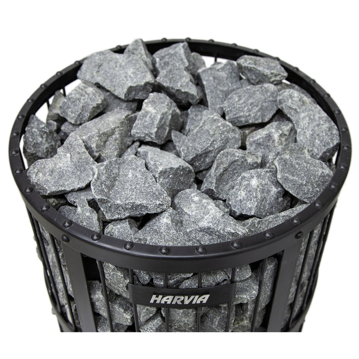 Top view of the sauna stones stacked in the round steel basket of the Harvia Legend stove
