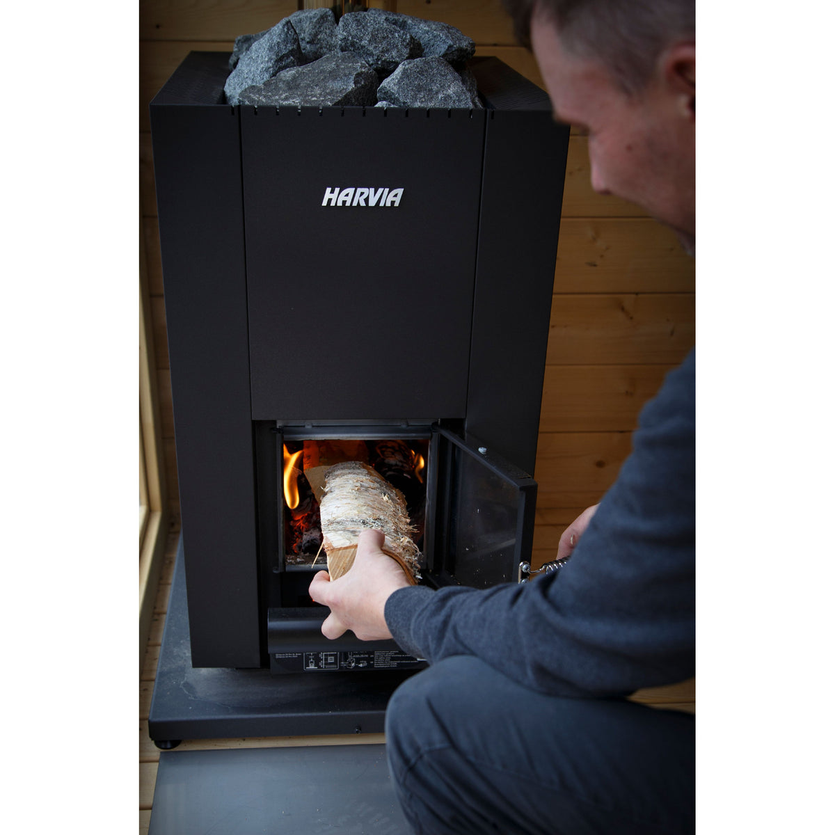 Lighting the fire in the Harvia Linear 18 Compact Black 14.3kW through the open fire door
