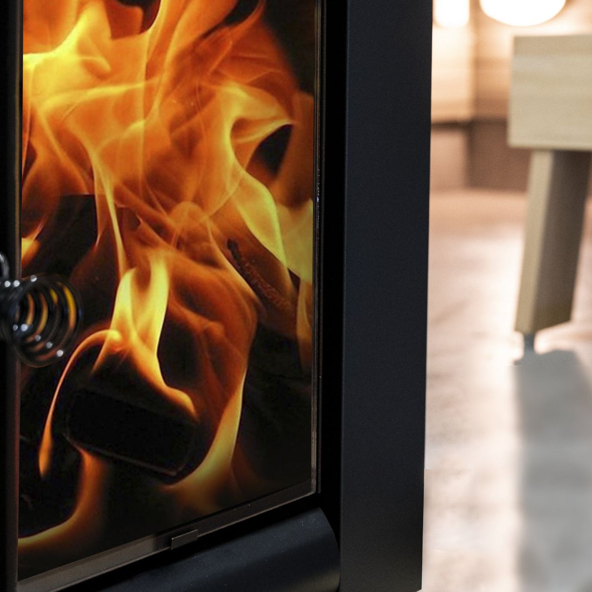 Close view of the flames behind the glass door of the Harvia Linear 22 GreenFlame ES wood-burning sauna stove