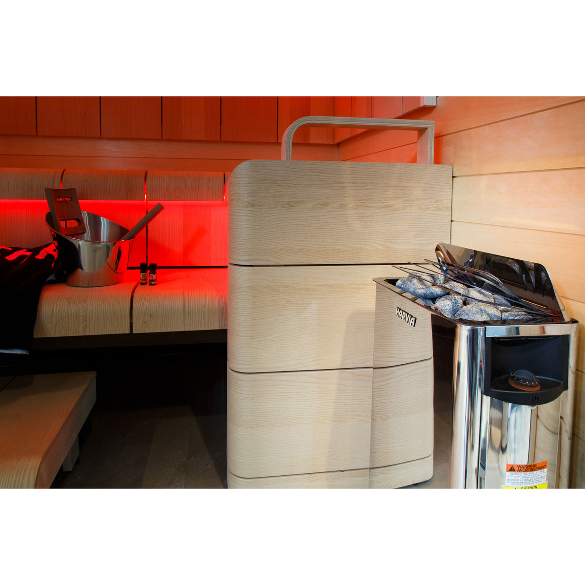 Harvia The Wall SW60 6kW in a sauna under red LED lighting